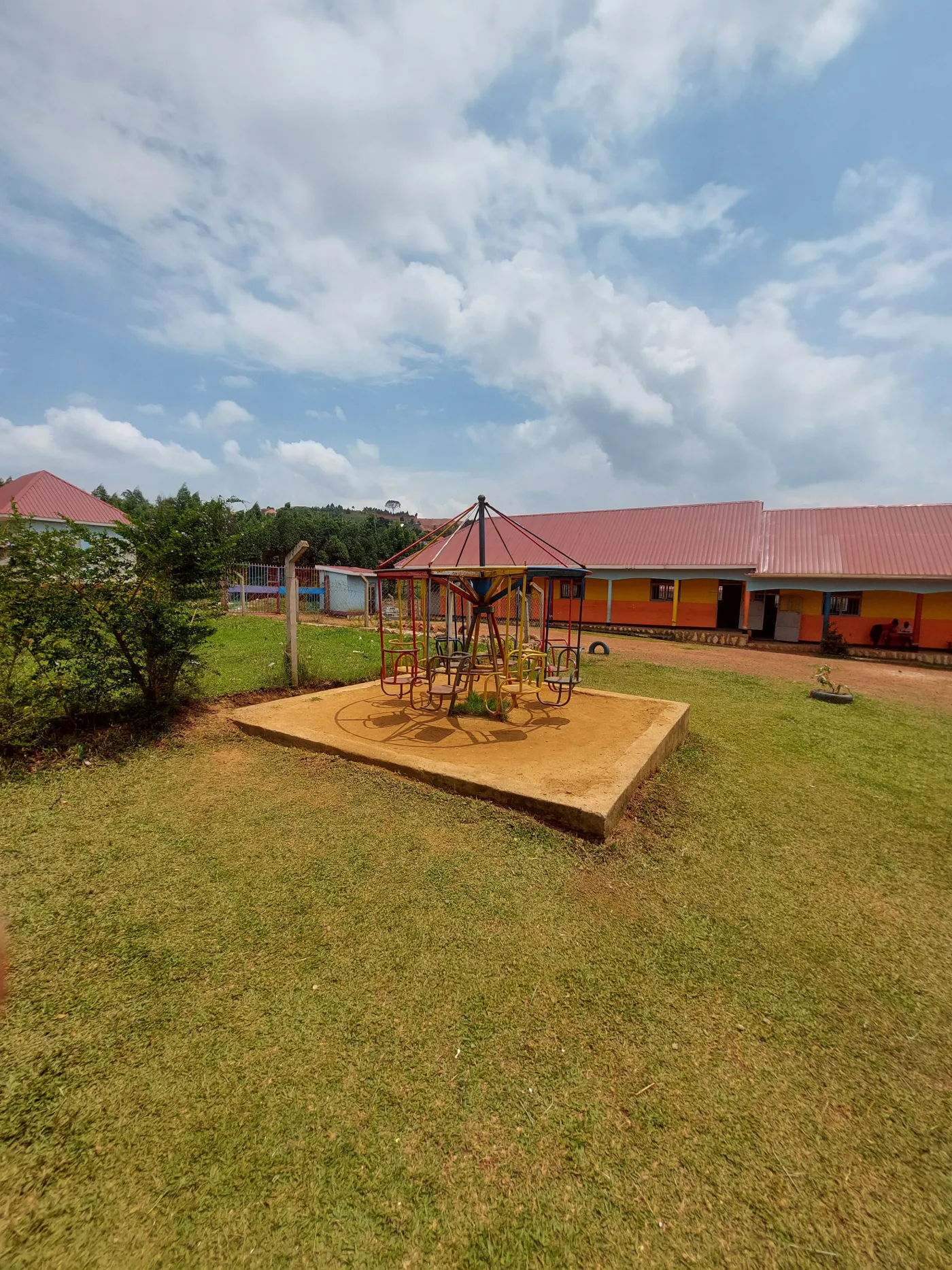 Playground merry-go-round at Wisdom Valley Nursery and Primary School